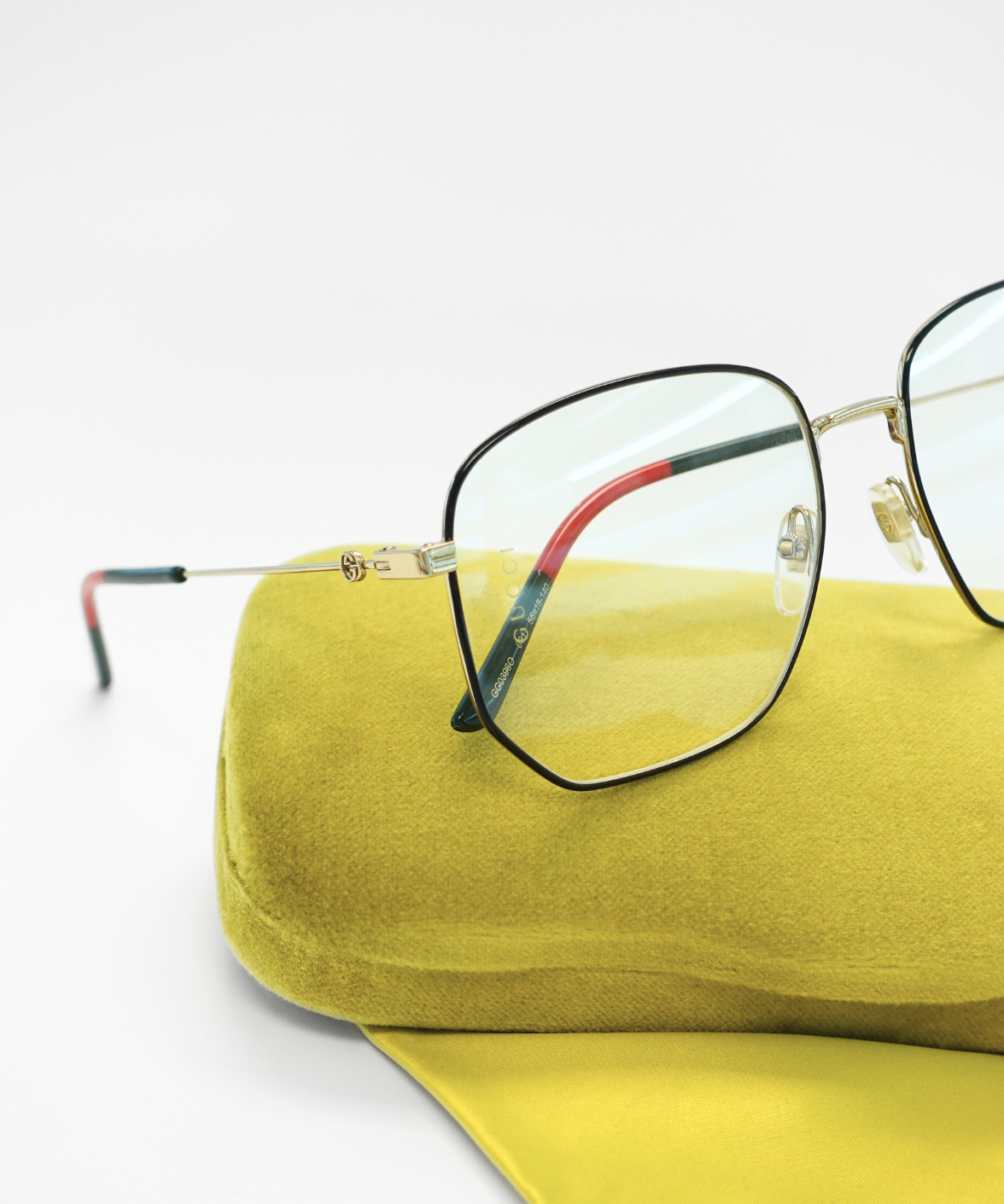 Gucci GG0396O Optics Eyeglasses Silver/Black/Gold | Jei & Co. Optics